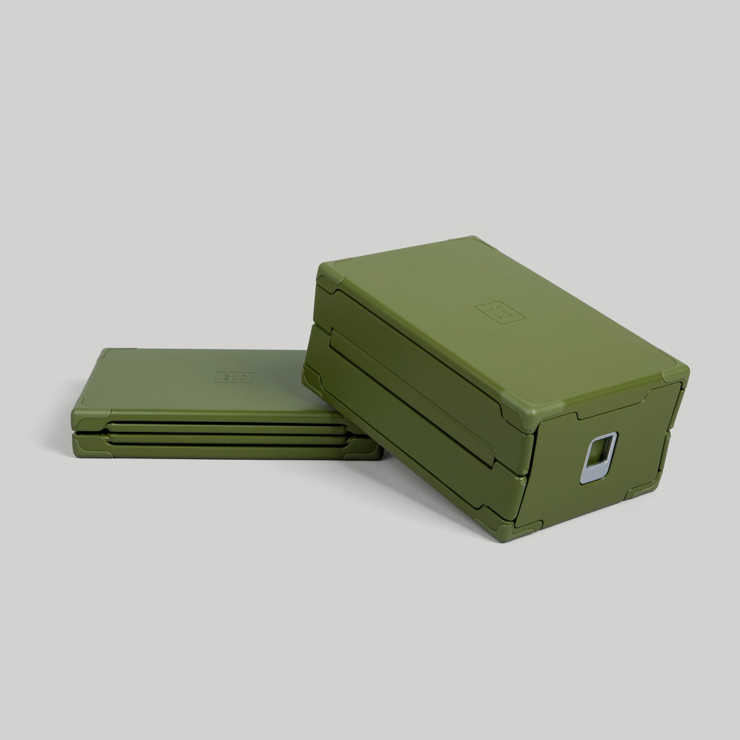 Sunsal collapsible yoga block in Sage, shown expanded and collapsed, on a light grey background