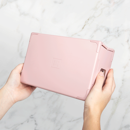 GIF showing hands demonstrating the collapsing mechanism of the Sunsal yoga block in Rosewood, highlighting its ease of use and innovative design